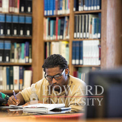 Student in library.